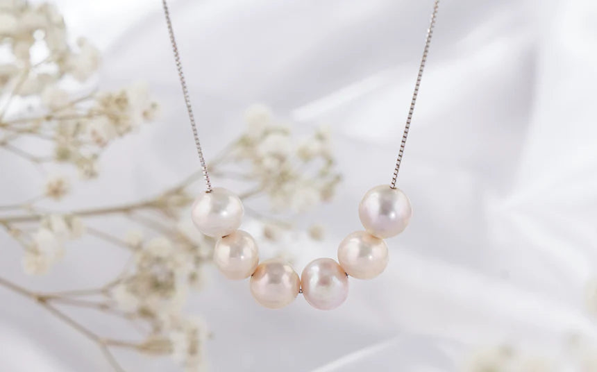 Step into Preala's exquisite collection: pearl pendants